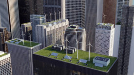 Editors Note Column opening image of building rooftop wind turbines and solar panels