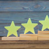 PME Top 20 Products of 2023 feature image of five wooden stars on the ladder upgrade rating of side-by-side stacked wooden blocks.