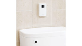 New Products: Flushmate Automated Flushing System, the I-Flush installed on the wall above toilet.