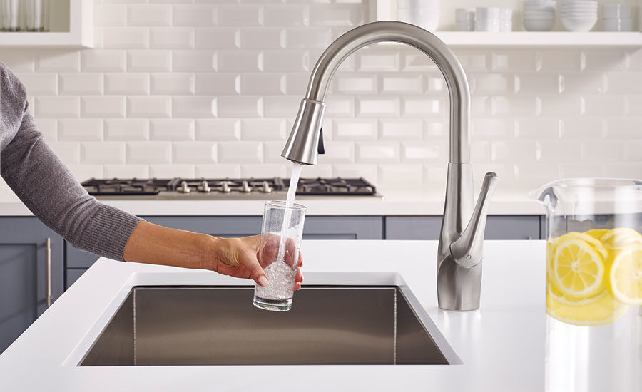 Users are able to select between tap and filtered water by pushing the hand...